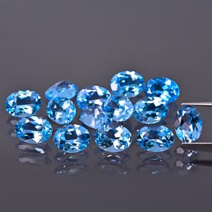 Piedra ovalada, cono - topacio Swiss Blue 6x4 MM