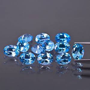 Piedra ovalada, cono - topacio Swiss Blue 7x5 MM