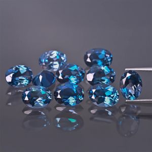 Piedra ovalada, cono - Topacio London Blue 7x5 MM